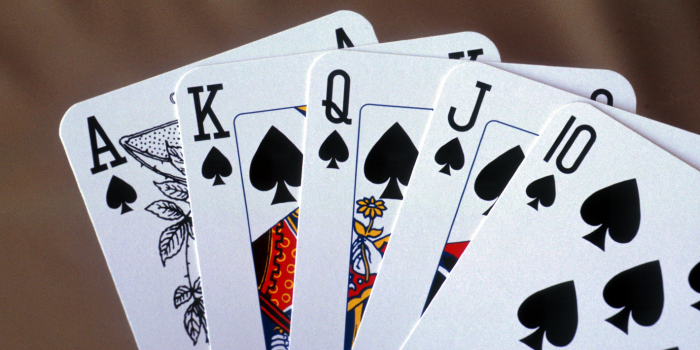 hand of 5 playing cards, royal flush in spades